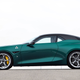 A profile view of the dark green Alfa Romeo Giulia SWB Zagato.